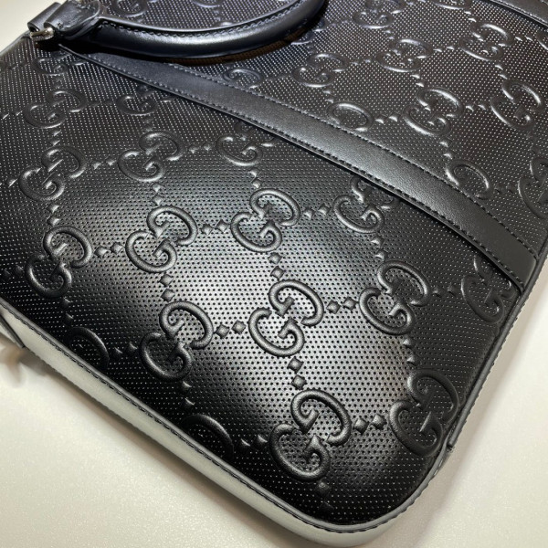 G*u*i gg embossed briefcase