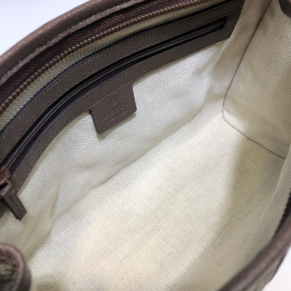 G*u*i ophidia toiletry case