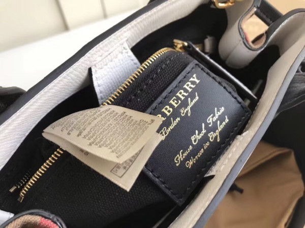 B**rry the small banner in leather and house check