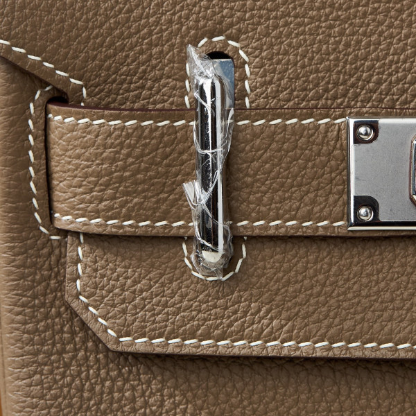 H**mes has a dos pm backpack togo leather