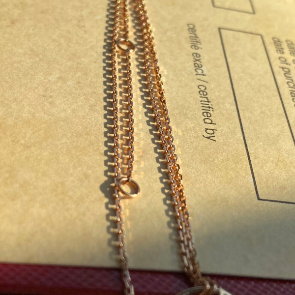 Ca*t*er amulet necklace