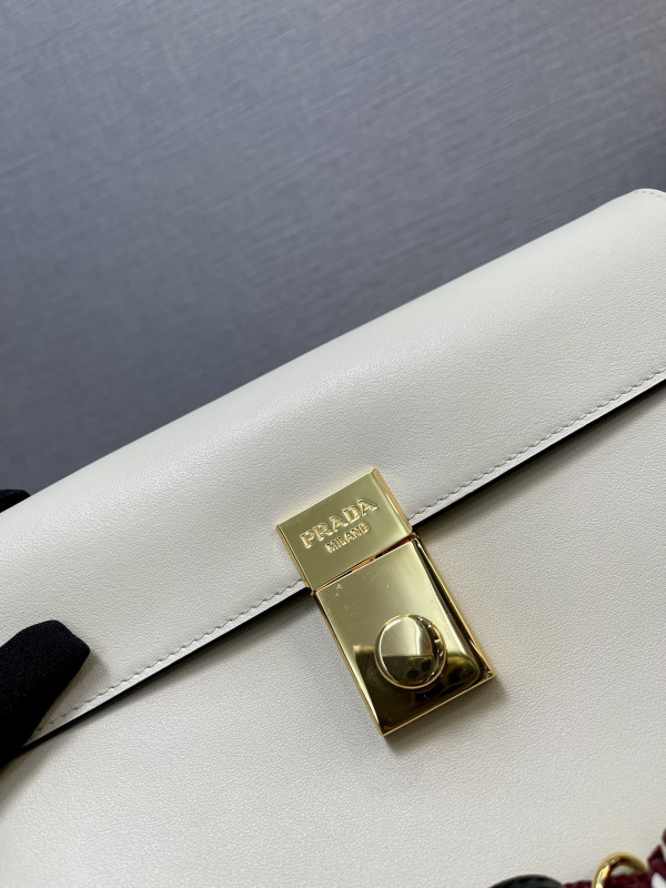 Pra*a soft sound small leather shoulder bag with charms