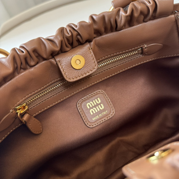 M*um*u joie nappa leather bag