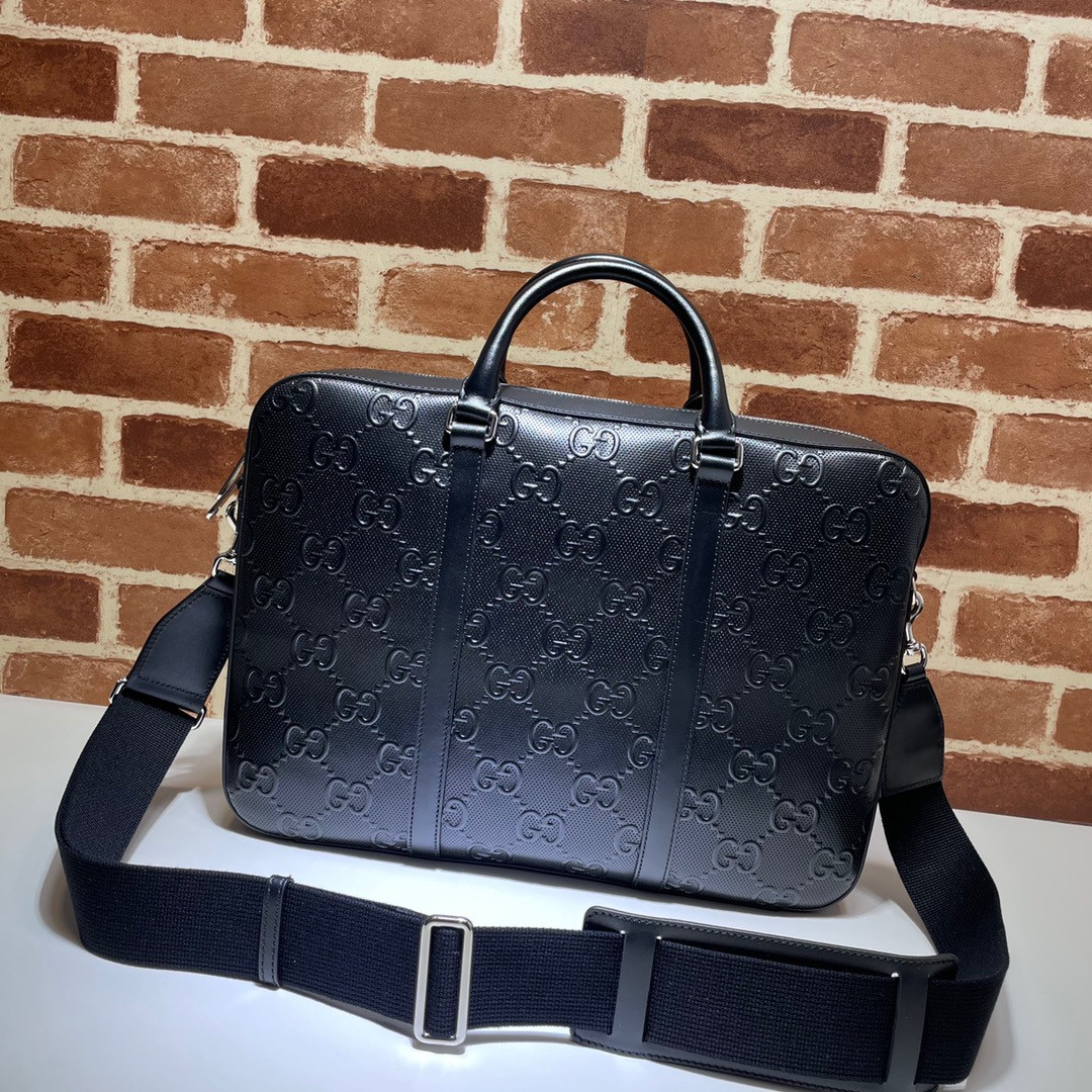 G*u*i gg embossed briefcase