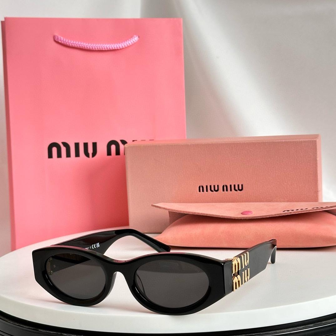 M*um*u sunglasses
